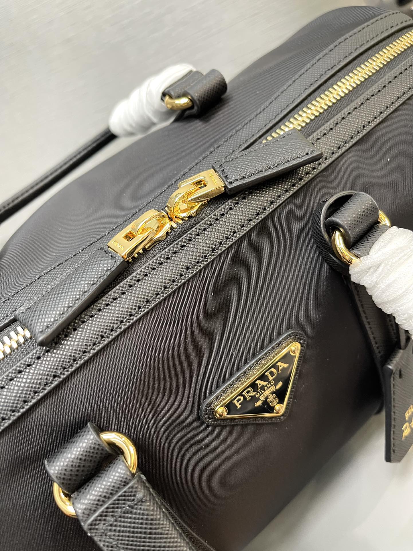 Prada Re Edition 1978 medium ReNylon And Saffiano Leather Top Handle Bag Black 1BB233